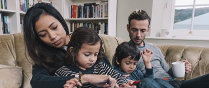 family relaxing indoors