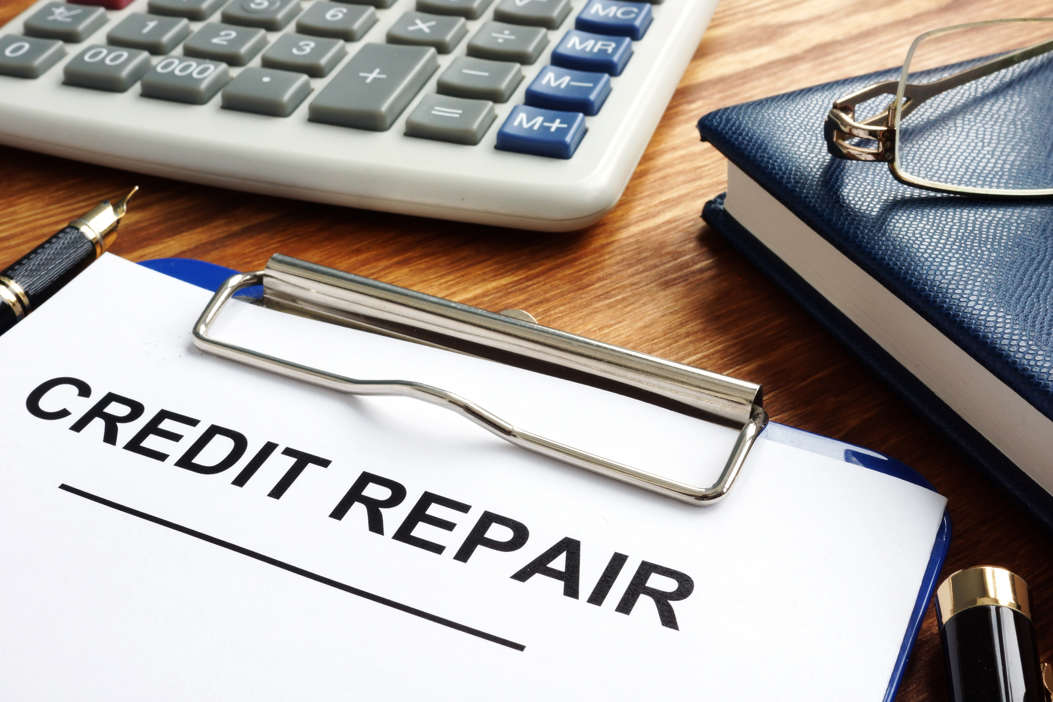 Clipboard saying Credit Repair 